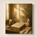 Christian canvas wall art of a sunlit windowsill with an open Bible, candle, cross and pink roses.