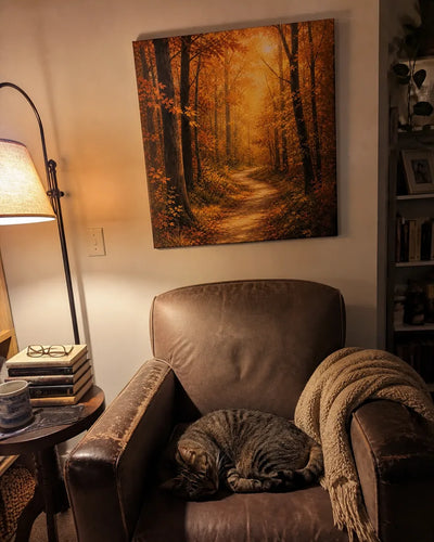 Customer photo of the canvas above an armchair in a reading corner at night